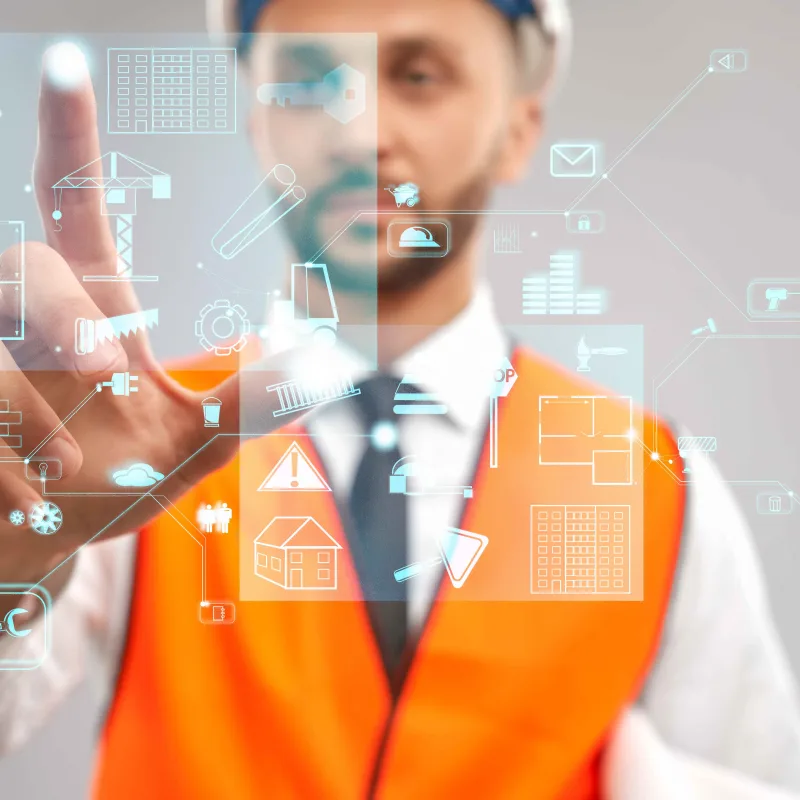 Construction project manager interacting with a digital interface displaying various construction tools and diagram