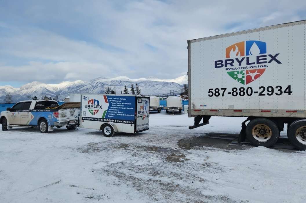 Brylex Restoration box truck parked at a snowy jobsite