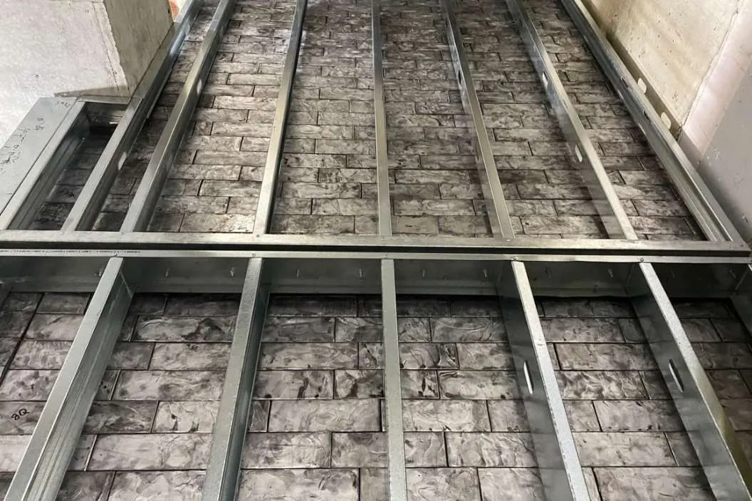 Steel roof decking installed over structural beams