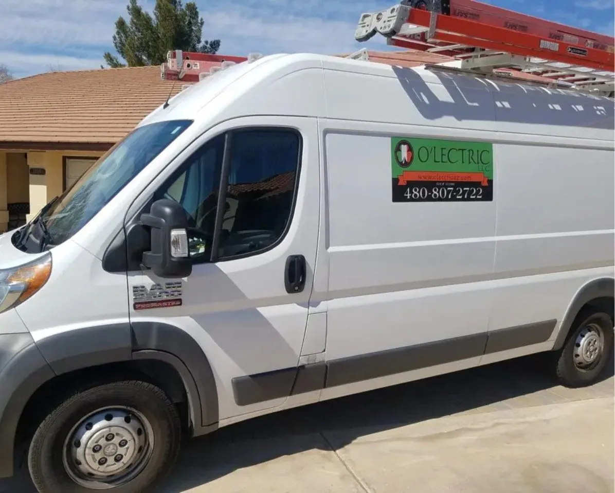 Electrical contractor work van at a jobsite