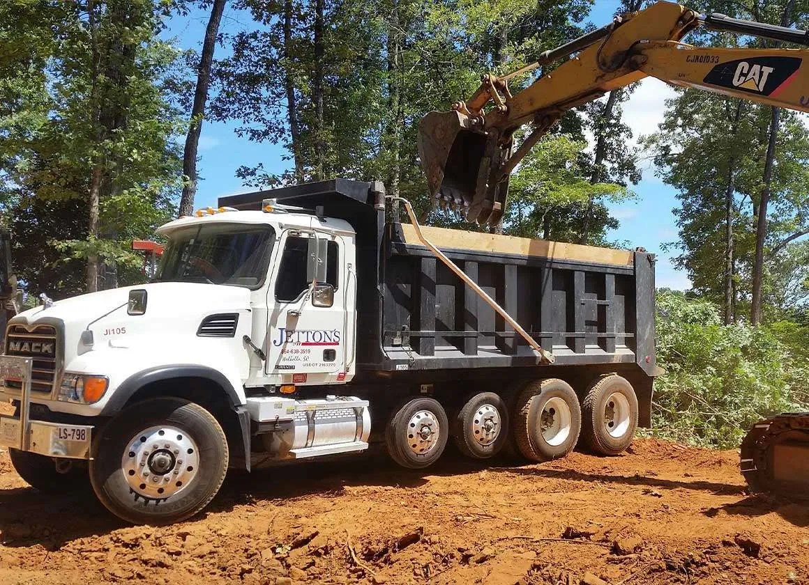 Dump truck working on a graded earthworks site