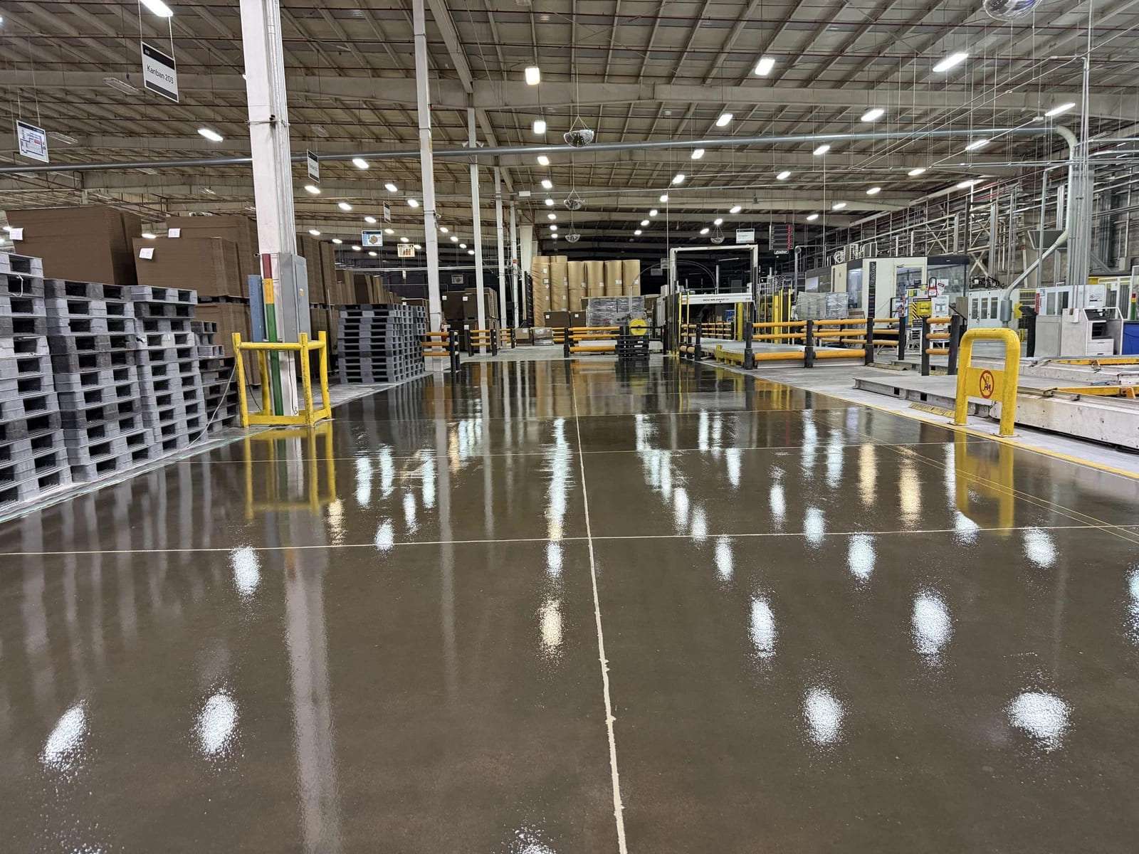 Large warehouse interior with a polished floor finish