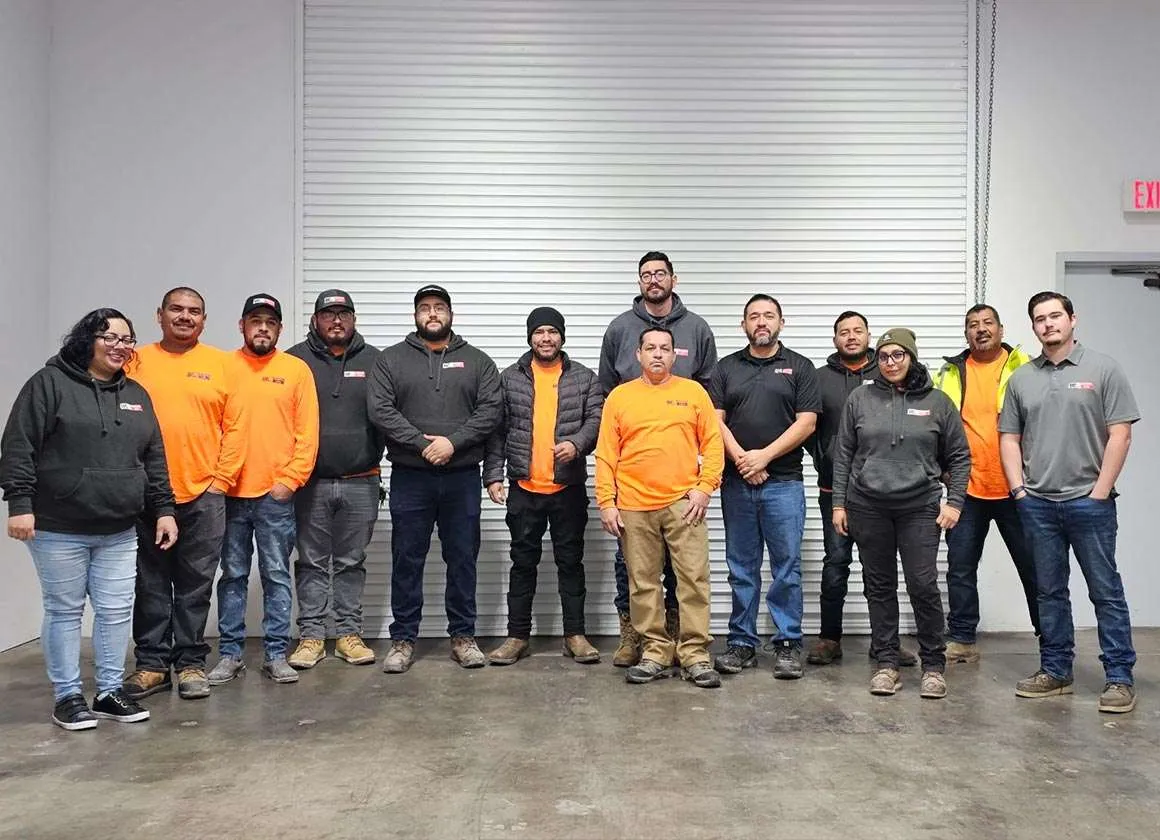 Construction company team gathered for a group photo